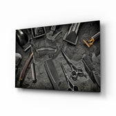 Art of barbering flat-lay cinematic glass wall art above barbershop leather chair