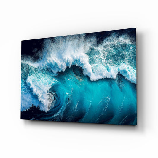 Aerial turquoise wave cinematic glass wall art above linen sofa in coastal living room