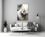 Ivory-and-gold horse cinematic glass wall art over walnut console in designer office