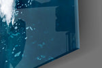 Wave-and-foam cinematic glass wall art over modern dining sideboard