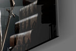 Lady-Justice cinematic glass wall art over walnut sideboard in dining room