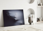 Atmospheric veiled-face cinematic glass wall art in designer cinema-room