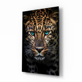 Blue eyed leopard portrait cinematic glass wall art above leather chair in gentleman's study