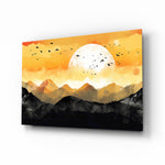 Stylized sunset mountain cinematic glass wall art above linen sofa in designer living room