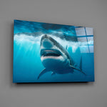 Cinema-poster shark glass wall art over walnut console in maritime study