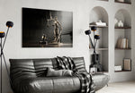 Statue-and-gavel cinematic glass wall art in designer-luxury entryway