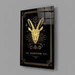 Gold-sigil Capricorn glass wall art in designer-luxury entryway