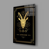 Gold-sigil Capricorn glass wall art in designer-luxury entryway