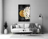 Boho-luxe gold disc cinematic glass wall art in boutique-hotel suite