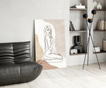 Picasso-line-drawing cinematic glass wall art beside master-bedroom dressing table
