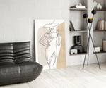 Picasso-line-drawing cinematic glass wall art beside master-bedroom dressing table