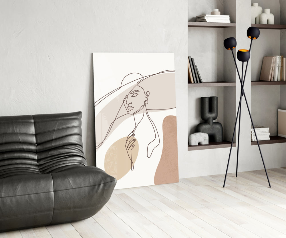 Picasso-line-drawing cinematic glass wall art beside master-bedroom dressing table