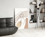 Picasso-line-drawing cinematic glass wall art beside master-bedroom dressing table