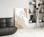 Picasso-line-drawing cinematic glass wall art beside master-bedroom dressing table