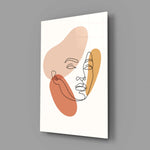 Matisse-style split-tone face cinematic glass wall art in wellness studio reception