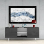 Blue Nebula glass wall art styled above a console in a reading nook