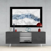 Blue Nebula glass wall art styled above a console in a reading nook
