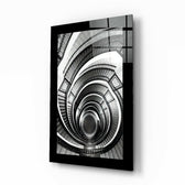 Spiral Stairs glass wall art displayed above a console in an entryway