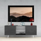 Foggy Horizons glass wall art styled above a console in a reading nook