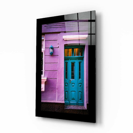 Colorful Building glass wall art displayed above a console in an entryway