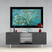 Turquoise Almond Flowers glass wall art styled above a console in a reading nook