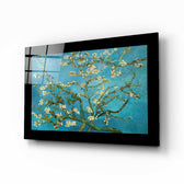 Turquoise Almond Flowers glass wall art displayed above a bed in a bedroom