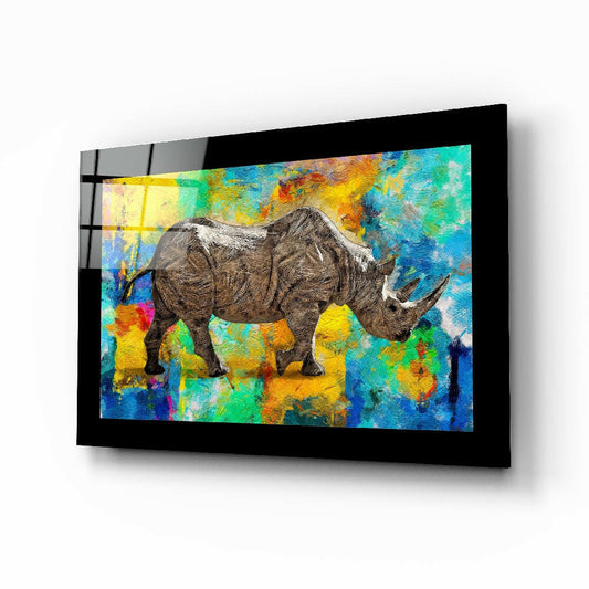 Colored Rhinoceros glass wall art displayed above a sideboard in a study