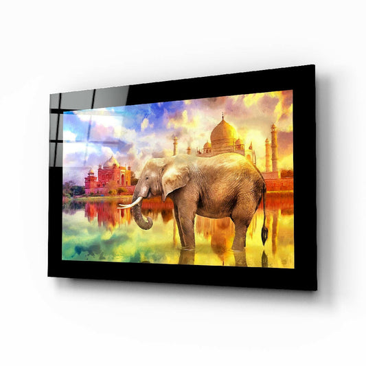 Elephant glass wall art displayed above a sideboard in a study