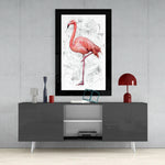 Lonely Flamingo glass wall art styled above a console in a reading nook
