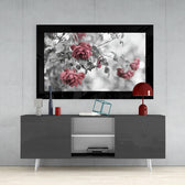 Rosewood glass wall art styled above a console in a reading nook