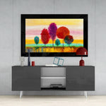Pastel Trees glass wall art styled above a sideboard in a reading nook