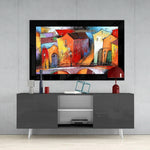 City Landscape glass wall art styled above a console in a reading nook