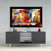 City Landscape glass wall art styled above a console in a reading nook