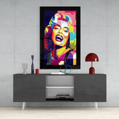 Marilyn Monroe glass wall art styled above a sideboard in a media room