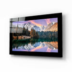 Glacier Lake glass wall art displayed above a bed in a bedroom