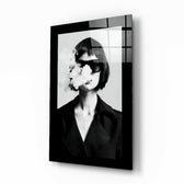 Smoke and Woman glass wall art displayed above a vanity in a dressing room