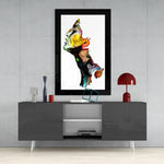 Abstract Thoughts glass wall art styled above a console in a reading nook