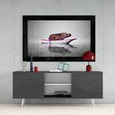 Hippo glass wall art styled above a sideboard in a reading nook
