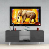 Elephant glass wall art styled above a console in a man cave