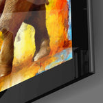 Elephant close-up showing tusked giant and saffron impasto