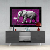 Elephant glass wall art styled above a console in a foyer