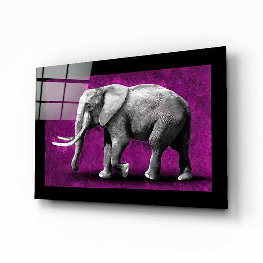 Elephant glass wall art displayed above a sideboard in a study