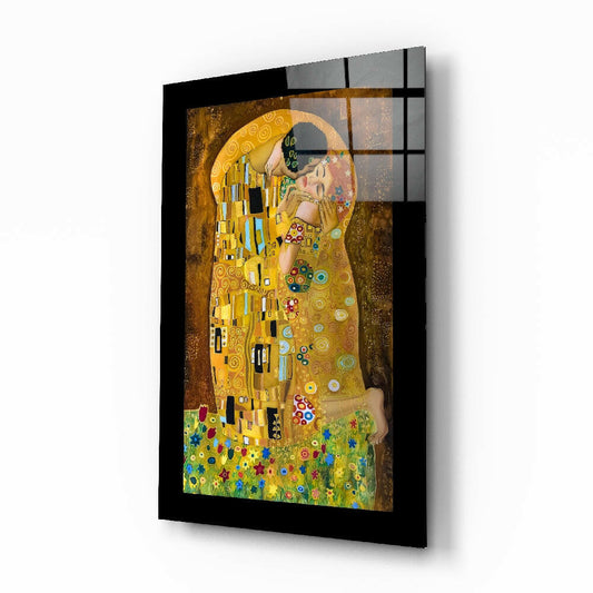 Gustav Klimt 'The Kiss' glass wall art displayed above a bed in a bedroom