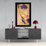 Woman Portrait glass wall art styled above a console in a creative studio