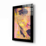 Woman Portrait glass wall art displayed above a bed in a bedroom