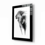 Elephant glass wall art displayed above a sideboard in a study