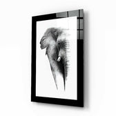 Elephant glass wall art displayed above a sideboard in a study
