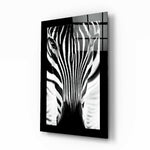 Zebra glass wall art displayed above a sideboard in a study