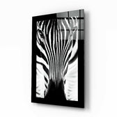 Zebra glass wall art displayed above a sideboard in a study