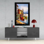 Fishing Town glass wall art styled above a console in a reading nook